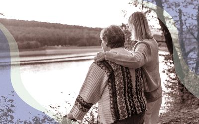 Woman and elder relative looking out to the water